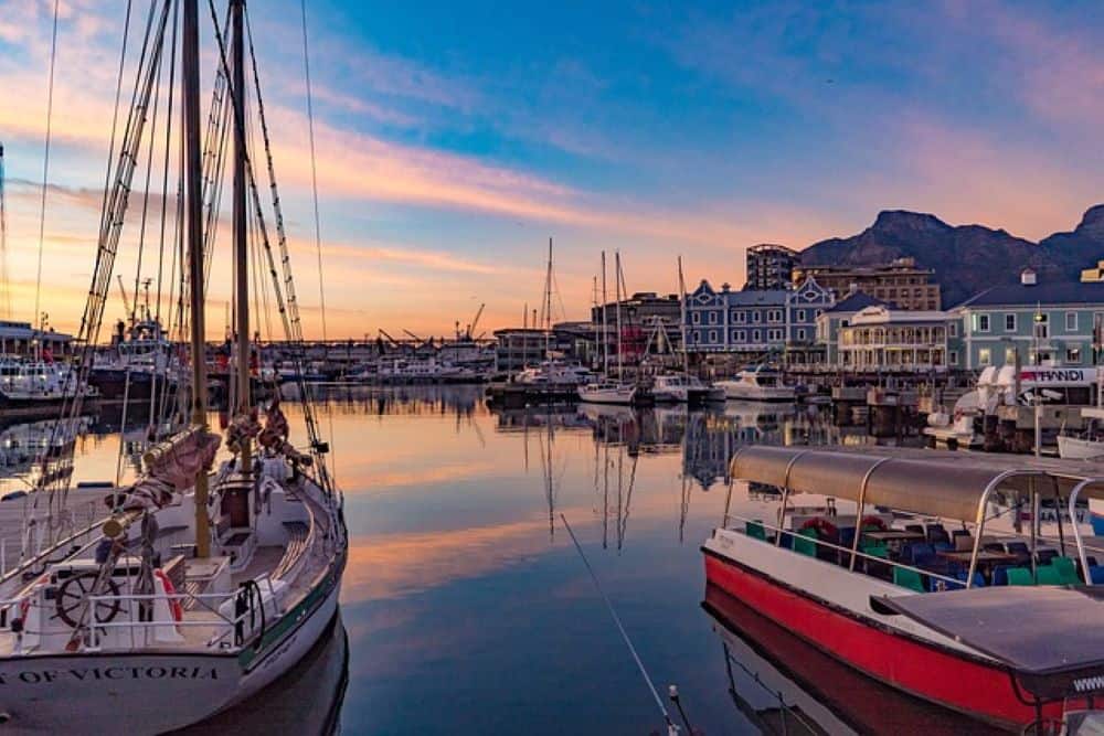 Watch a beautiful sundown from Cape town's famous beaches Camps Bay and Clifton.