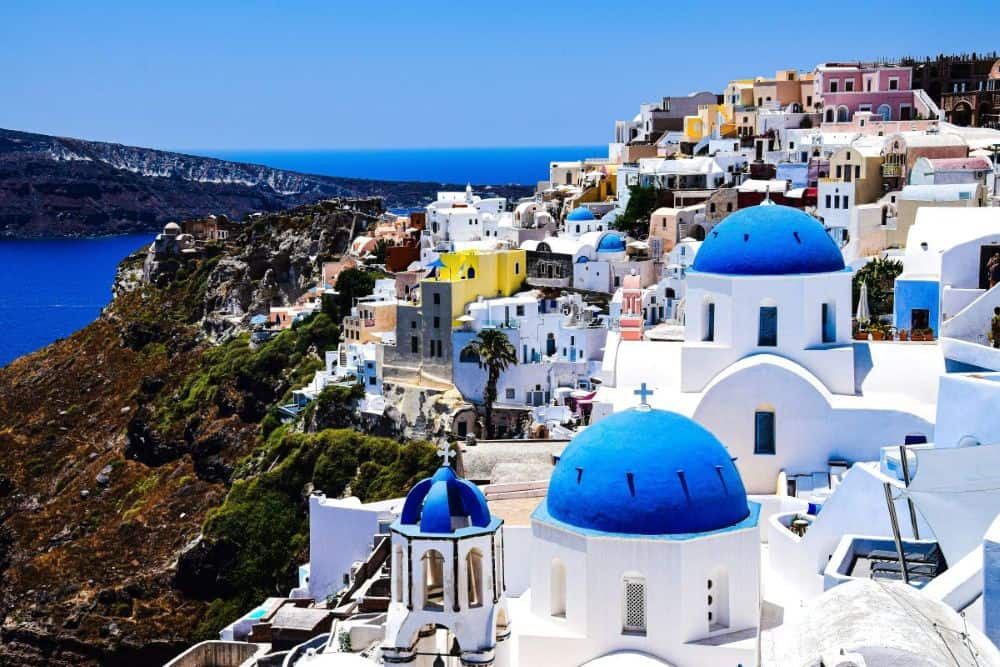 The blue domes and whitewashed buildings and its breathtaking architecture make Santorini a dreamy honeymoon destination.